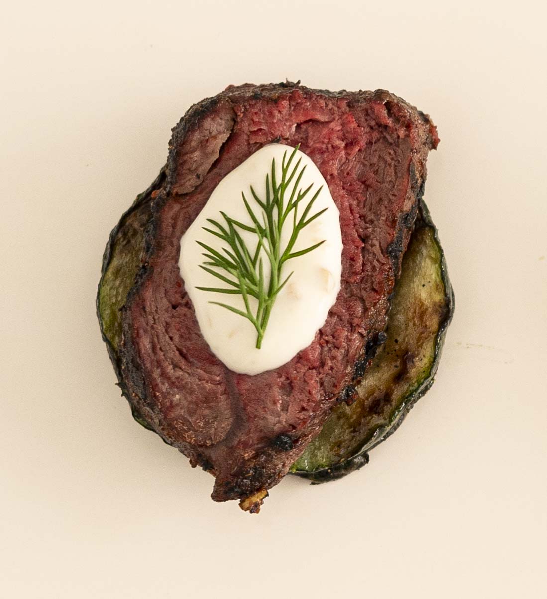 Sliced Emu w/ Balsamic Glaze on Cucumber