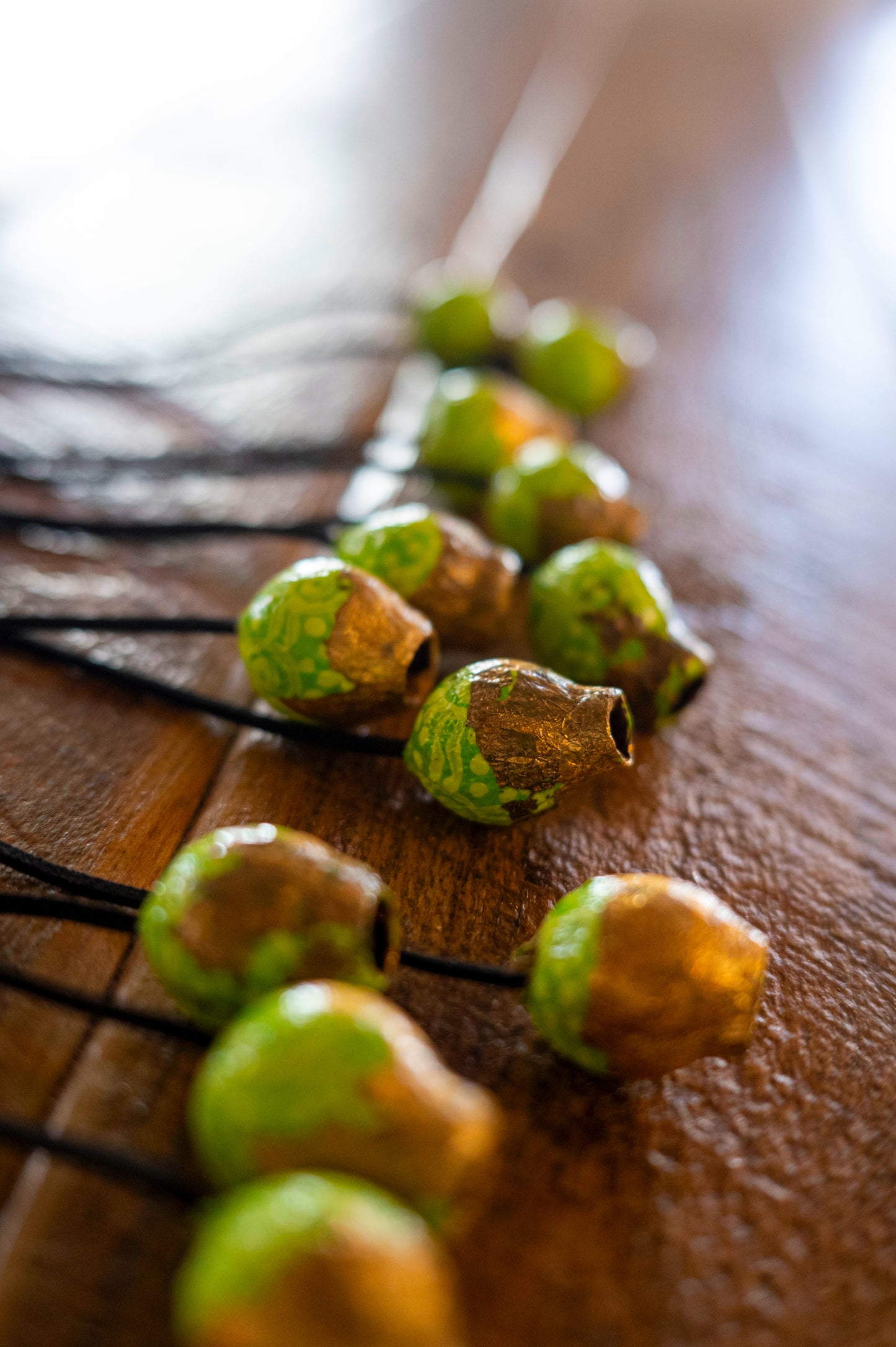 Handpainted Gumnut and gold leaf necklace